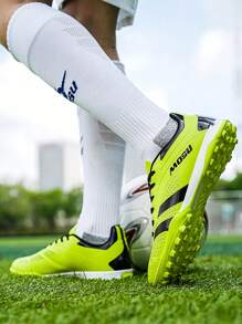 Un par de tacos de fútbol profesionales para niños - para terreno de césped artificial, transpirables y ligeros para entrenamiento y competición