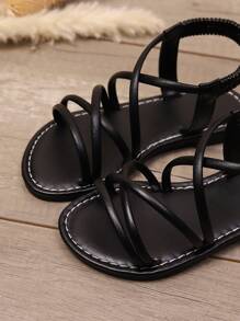 1 Pair White Plus Size Toddler Girls Flat Sandals, Solid Color PU Criss-Cross Strap, Elastic Back Heel Design, Round Toe Open Toe, Non-Slip Lightweight Sole, Fashion & Cute Roman Style Sandals, Suitable For 3-15 Years Old Boys & Girls For Daily, Party, Travel, Spring/Summer - Black - View 6