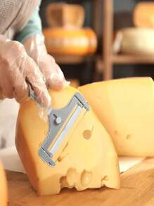 An Adjustable Cheese Slicer - Easily Cut Perfectly Thin Or Thick Slices For Restaurant Use