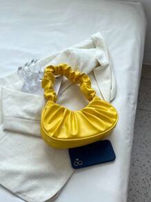 Nuevo bolso de mujer de moda en forma de media luna, personalizado, plegable y portátil, de estilo de red de colores, bolso de hombro en color amarillo mantequilla de moda para mujeres