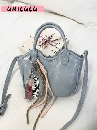 新款 2025 超流行简约百搭小众篮式手提包女士新款高端单肩斜挎水桶包。