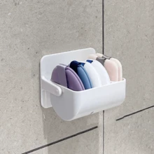 Caja de almacenamiento de motas, soporte giratorio montado en la pared para dividir las esponjas de maquillaje, cojín de aire no perforado, estante transpirable para huevos de belleza