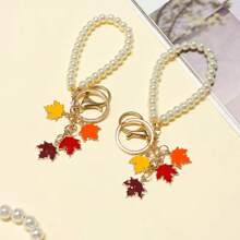 Llavero minimalista, de moda y encantador con hoja de arce y perla falsa, material de aleación DIY para accesorios de bolso, colgante, regalo memorable para amigos y familiares, accesorios para automóvil, accesorios para bolso, planta, perla falsa, gótico lindo, accesorios para bolso Y2K, cordones con soporte para identificación, accesorios para automóvil, encantos para bolso, ideas de regalo de Navidad, auto, maestro, hermana - Multicolor - Ver 1