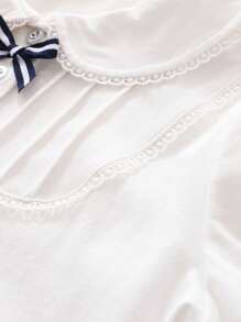 Blusa con cuello con volantes y decoración de moño elegante para niñas, parte superior casual de unicolor estilo universitario, moda de verano para niñas preadolescentes