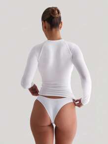 Camiseta básica de manga larga con cuello pequeño y raglán sólida de XLLAIS para mujer, de punto deportivo, color blanco
