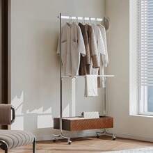1. Un cintre de vêtements de luxe léger 2. Un séchoir à vêtements sur pied pour chambre à coucher 3. Un porte-manteau d'angle mobile haut de gamme 4. Une étagère de rangement de vêtements pour la nuit 5. Un cintre de vêtements sur pied vintage moderne en acier inoxydable 6. Un porte-manteau 7. Une étagère de rangement mobile pour chambre à coucher