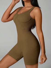 Tuta da donna alla moda, lavorata a coste, con vita stringata e spalline imbottite, adatta per uso esterno, primavera/estate