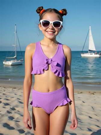 Nuevo diseño de traje de baño para niñas, elaborado con material especial dividido en tipo lazo y volantes, traje de baño morado para niños mayores