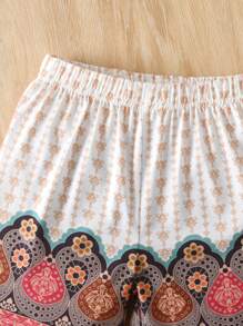 Set de 2 piezas con camiseta de manga corta con estampado vintage y pantalones cortos para niño pequeño
