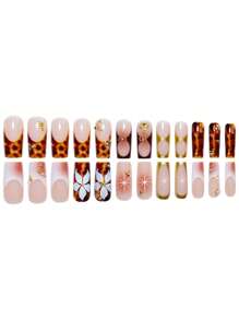 24 piezas de diseños de arte de uñas floral elegante - base marrón con estrellas, líneas doradas y elementos rayados, creando un efecto visual vanguardista y único, que permite a las damas lograr un estilo de uñas postizas atrevido, personalizado