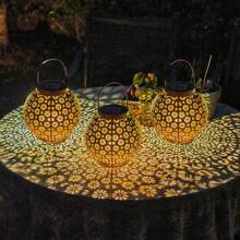 1pc Solar Powered Iron Lantern With Hollow Design - Multifunctional Outdoor Decoration Suitable For Garden, Patio, Balcony And Lawn - Energy Saving, Easy Installation, Creating Holiday Ambience