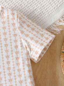 Set de 2 piezas con camiseta de manga corta con estampado vintage y pantalones cortos para niño pequeño