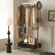 1. Un cintre de vêtements de luxe léger 2. Un séchoir à vêtements sur pied pour chambre à coucher 3. Un porte-manteau d'angle mobile haut de gamme 4. Une étagère de rangement de vêtements pour la nuit 5. Un cintre de vêtements sur pied vintage moderne en acier inoxydable 6. Un porte-manteau 7. Une étagère de rangement mobile pour chambre à coucher