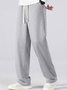 1 条男士宽松时尚运动长裤，采用休闲简约纯色阔腿设计，腰部抽绳，大口袋，适合日常散步、工作、旅行等。 - 淺灰色 - 查看 6