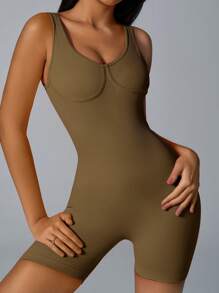Tuta da donna alla moda, lavorata a coste, con vita stringata e spalline imbottite, adatta per uso esterno, primavera/estate