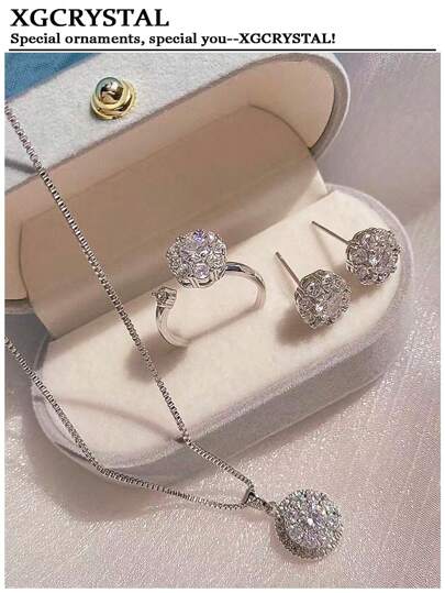1 طقم مجوهرات فاخر يتكون من قلادة نحاسية مرصعة بالزركونيا مع أقراط وخاتم، 4 قطع، يرمز إلى الحظ الجيد للنساء، مناسب لحفلات السهرات والرقص والأعياد والمناسبات الخاصة والزفاف والخطوبة، هدية عيد الأم