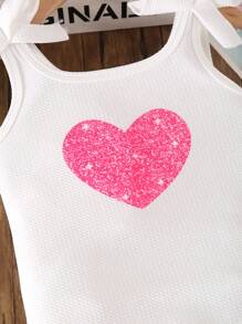 Top estivi senza maniche da ragazza, casual e carini, con decorazione a fiocco e stampa a cuore, versatili per uscite e uso quotidiano