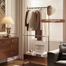 1. Un cintre de vêtements de luxe léger 2. Un séchoir à vêtements sur pied pour chambre à coucher 3. Un porte-manteau d'angle mobile haut de gamme 4. Une étagère de rangement de vêtements pour la nuit 5. Un cintre de vêtements sur pied vintage moderne en acier inoxydable 6. Un porte-manteau 7. Une étagère de rangement mobile pour chambre à coucher