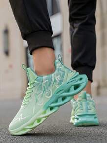1 paire de chaussures de course décontractées et respirantes, style sport, en tricot à rayures de flamme, avec design à lacets à l'avant, pour homme