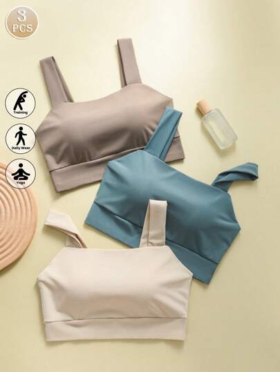 3 piezas Sujetadores deportivos de unicolor para mujer, ligeros y sin cables, con copas fijas, antideslizantes y gruesos, que recogen y dan forma, con absorción de impactos; Camiseta interior sin costuras minimalista, de tirantes anchos y cómoda para deportes al aire fitness.