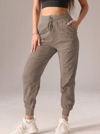 1 قطعة بنطلون طويل كاجوال بتصميم رياضي مطوي بلون أحادي للنساء