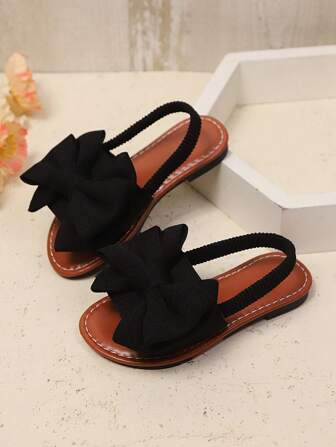 1 Pair Plus Size Black Toddler Girl Flat Sandals With Solid Color Mesh Big Bow Decor, Elastic Back Strap Round Toe Non-Slip Sole, Elegant & Cute Roman Style Shoes Suitable For 3-15 Years Old Students For Daily, Party, Travel, Spring/Summer 2025