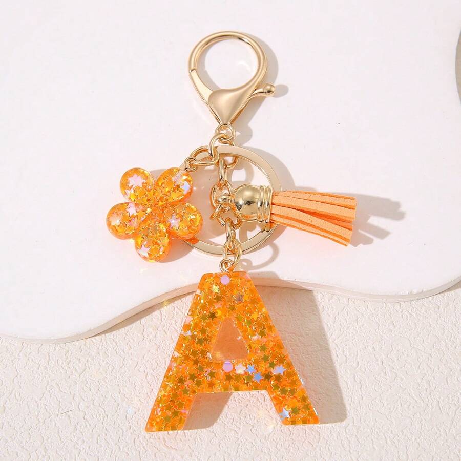 Móc khóa chữ cái hoa sequin sang trọng với tua rua vàng và điểm nhấn lấp lánh - Mặt dây chuyền chữ bằng nhựa dành cho phụ nữ và trẻ em gái - Lý tưởng cho chìa khóa xe, ví, ba lô - Quà tặng hoàn hảo, quà tặng cho phụ nữ | Chi tiết tua rua thanh lịch | Móc cài, móc khóa dễ thương cho bé gái Phụ kiện túi xe hơi Phụ kiện túi đeo chéo phong cách Goth Y2k Phụ kiện dây đeo có ngăn đựng thẻ Phụ kiện túi xe hơi Phụ kiện túi đeo chéo Giáng sinh - Nhiều màu - Xem 1