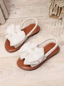 1 par de sandalias planas blancas de talla grande para niñas bebés/niñas pequeñas, con decoración de lazo de malla de unicolor, correa elástica en la parte trasera, punta redonda, suela antideslizante y ligera, estilo gladiador de moda para el verano, adecuadas para niñas de 3 a 15 años para uso diario, fiestas y viajes