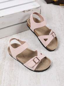 1 par de sandalias planas, anchas y de color rosa claro para niñas y niños pequeños, con correa de PU y hebilla metálica, diseño de correa con , punta redonda, antideslizante, de estilo romano, fashionables y lindas, para estudiantes de 3 a 15 años, uso diario, fiesta, casual, vacaciones, primavera/verano 2025
