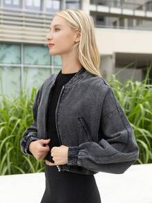 Faded denim bomber jacket Raglan pockets Puffy sleeves Elastic waist and cuffs