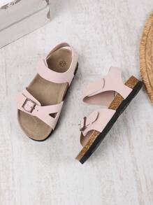 1 par de sandalias planas, anchas y de color rosa claro para niñas y niños pequeños, con correa de PU y hebilla metálica, diseño de correa con , punta redonda, antideslizante, de estilo romano, fashionables y lindas, para estudiantes de 3 a 15 años, uso diario, fiesta, casual, vacaciones, primavera/verano 2025