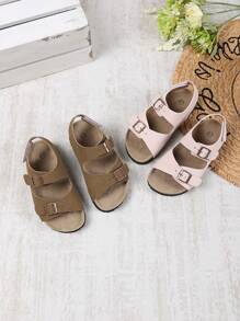 1 par de sandalias planas marrón para niñas de talla grande y ancha, con correa de unicolor, hebilla metálica, diseño de, punta redonda, antideslizante, estilo romano lindo y de lujo, adecuado para niños y niñas de 3 a 15 años, para uso diario, fiesta, casual, vacaciones, nueva llegada primavera/verano 2025 - Marrón - Ver 1
