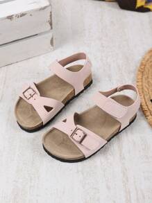 1 par de sandalias planas, anchas y de color rosa claro para niñas y niños pequeños, con correa de PU y hebilla metálica, diseño de correa con , punta redonda, antideslizante, de estilo romano, fashionables y lindas, para estudiantes de 3 a 15 años, uso diario, fiesta, casual, vacaciones, primavera/verano 2025