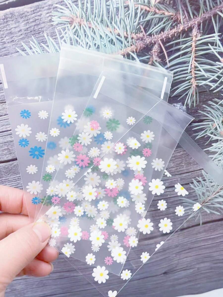 50pcs/100pcs Durable Daisy Pattern Opp Self-Sealing Bags, Mini Flower Printed Gift Bags,Transparent Decorative Bags For Party,Christmas , Gift Packaging Pags For Cards, Candy, Jewellery - Clear - View 1