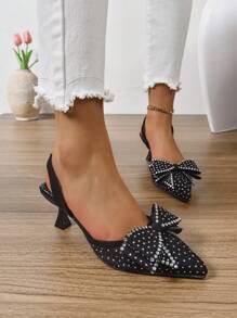 时尚女士新款尖头水钻扣蝴蝶结高跟鞋，适合夜场、派对、婚礼、办公室等场合，与女士服装完美搭配