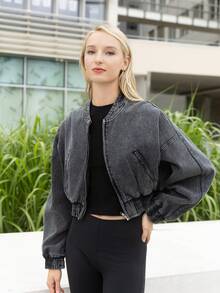 Faded denim bomber jacket Raglan pockets Puffy sleeves Elastic waist and cuffs