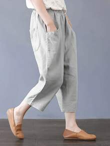 大码女式纯色休闲宽松七分裤，带大口袋