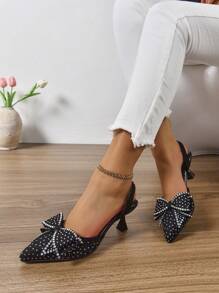 时尚女士新款尖头水钻扣蝴蝶结高跟鞋，适合夜场、派对、婚礼、办公室等场合，与女士服装完美搭配