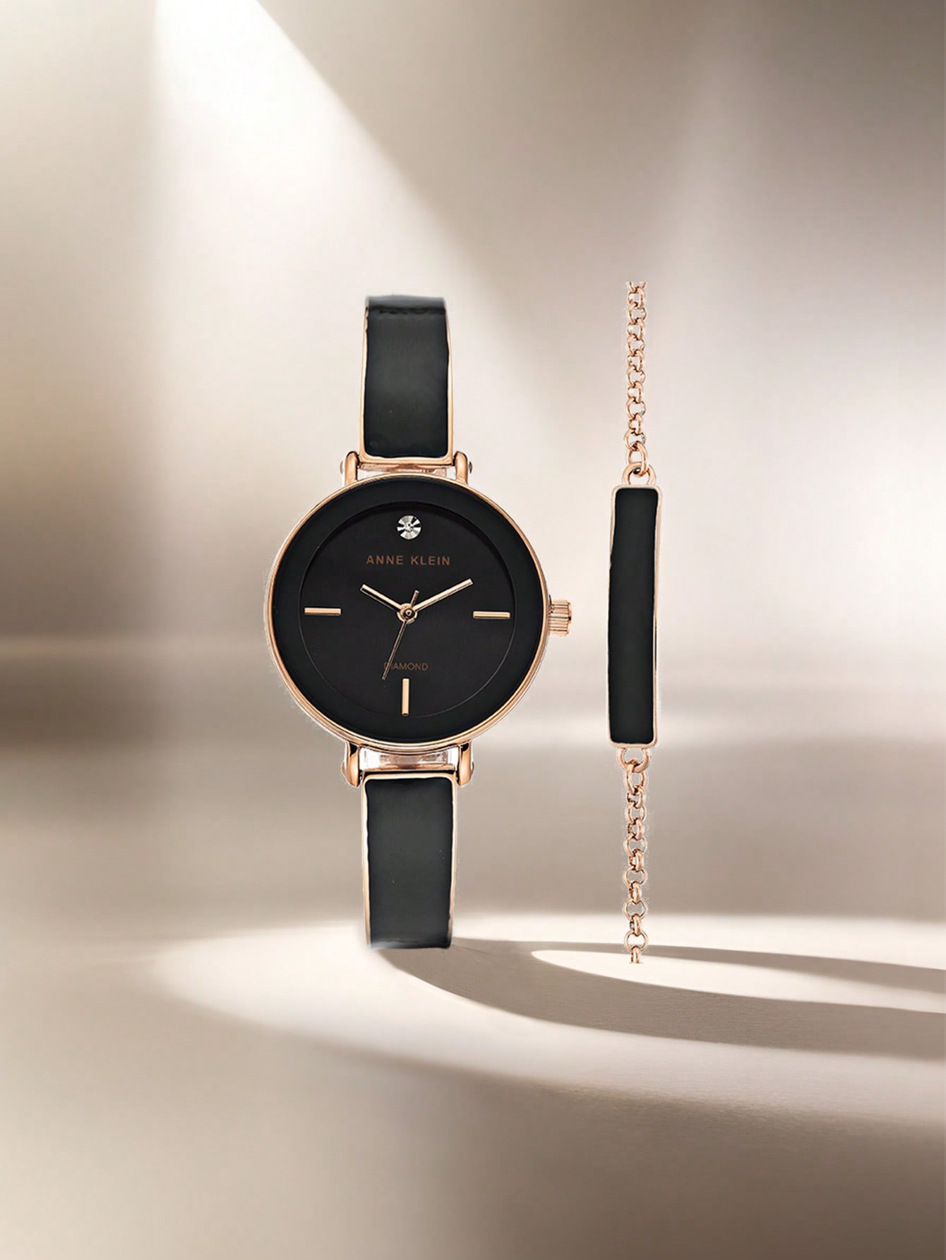 Anne Klein ساعة كوارتز بمينا ألماس للنساء مع سوار...
