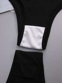 4 pezzi Mutande sportive a T alla moda da donna con fasce nere a righe e logo