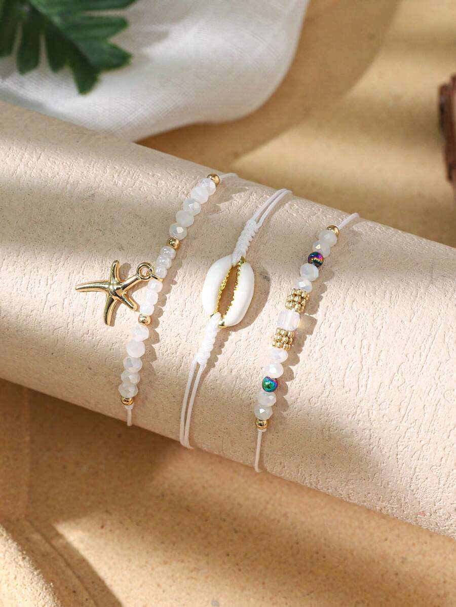 3 chiếc vòng tay theo chủ đề đại dương theo phong cách Bohemian có vỏ sò, sao biển, rùa biển, ốc xà cừ, cá heo, trái tim, pha lê hình con mắt, thích hợp cho phụ nữ đeo trong các dịp thường ngày, đi nghỉ, du lịch và tiệc tùng