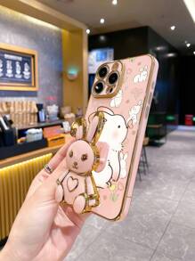 1 stuk hoogwaardig roze gegalvaniseerd telefoonhoesje, effen kleur, schattig konijnencartoon, opvouwbare standaard, volledig dekkende beschermhoes met standaard, compatibel met 16 Pro Max/ 11/ 13/ 15 Pro Max/Apple-serie, S24 Ultra/S23 Ultra/Galaxy A05S/A15 5G/Galaxy A54/serie, Redmi Note 13 4G/Redmi Note 13 Pro 4G/serie