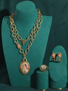 Juego de joyas vintage chapado en oro de 18 quilates con collar, aretes y anillo con diseño bohemio de conchas, mapa náutico y colorido