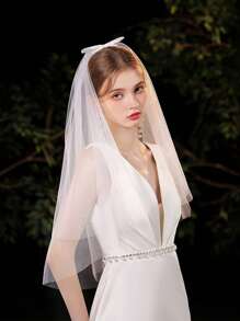 1件白色丝带蝴蝶结面纱，优雅涤纶材质，镶嵌闪亮黑色水钻，春夏情人节配饰