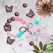 Juego de 25 piezas de cuentas de silicona con forma de mariposa - Kit de abalorios para manualidades de joyería DIY, llaveros, decoración de bolígrafos y accesorios de cadena de bolsos - Cuentas para decoración de pulseras, collares y colgantes - Material de silicona sin costuras - Multicolor - Ver 6