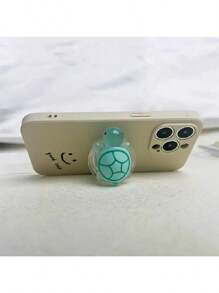 1 pieza Soporte de teléfono con forma de tortuga luminosa, elaborado en material ABS, pequeño, plegable y retráctil, adecuado para smartphones, soporte de teléfono creativo, ideal como regalo para amigos, compatible con iPhone y teléfonos Android, regalo para cumpleaños, familia y amigos, agarre de teléfono deslizante, accesorios de teléfono