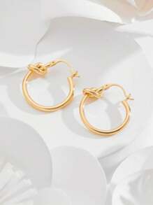 A pair of stainless steel earrings