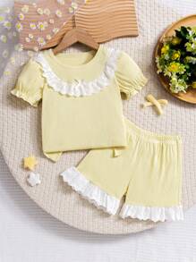 Conjunto de 2 piezas con blusa de manga abullonada con volantes y moño, y pantalones cortos con volantes, para niña, para la primavera/verano