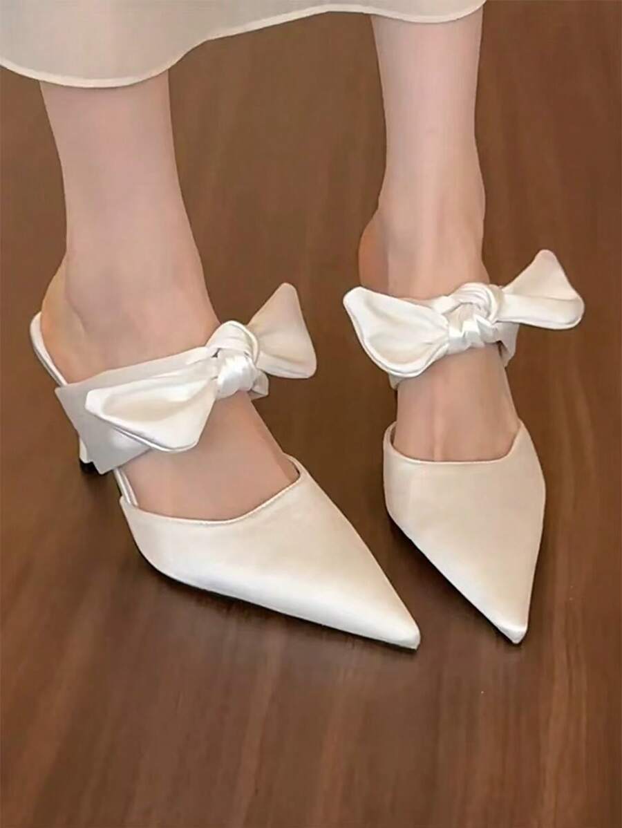 缎面尖头蝴蝶结穆勒鞋一脚蹬细高跟凉鞋，2025 年春夏新品系列
