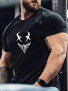 Męska czarna koszulka z nadrukiem, idealna dla fanów fitnessu i swobodnych stylizacji, graficzna męska czarna koszulka, najwyższy komfort podczas ćwiczeń i odważnego codziennego noszenia
